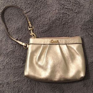 Coach wristlet gold